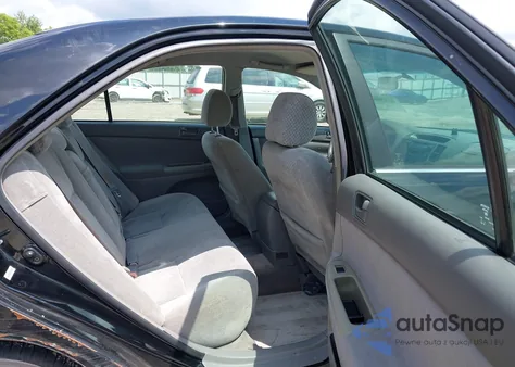 2003 Toyota Camry Le z USA, uszkodzony, nr VIN 4T1BE32K23U148976